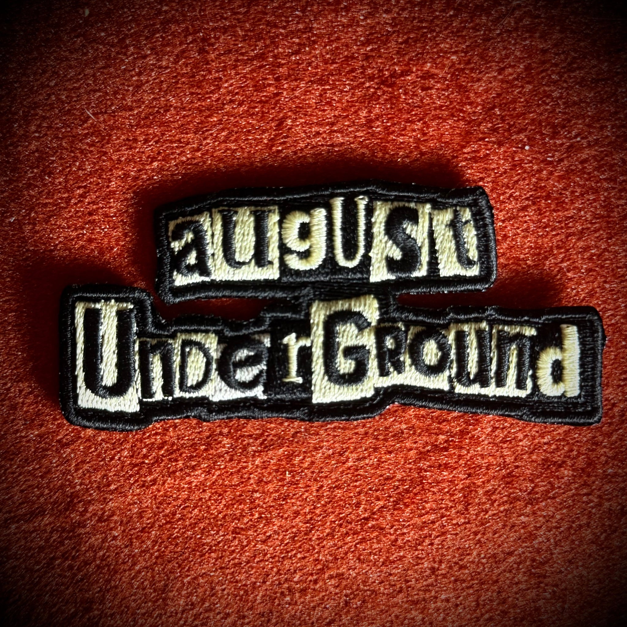 August Underground logo embroidered patch front view